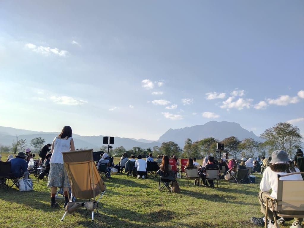 Folk-duo artists Selina and Sirinya performing a concert in Chiang Dao, Chiang Mai.