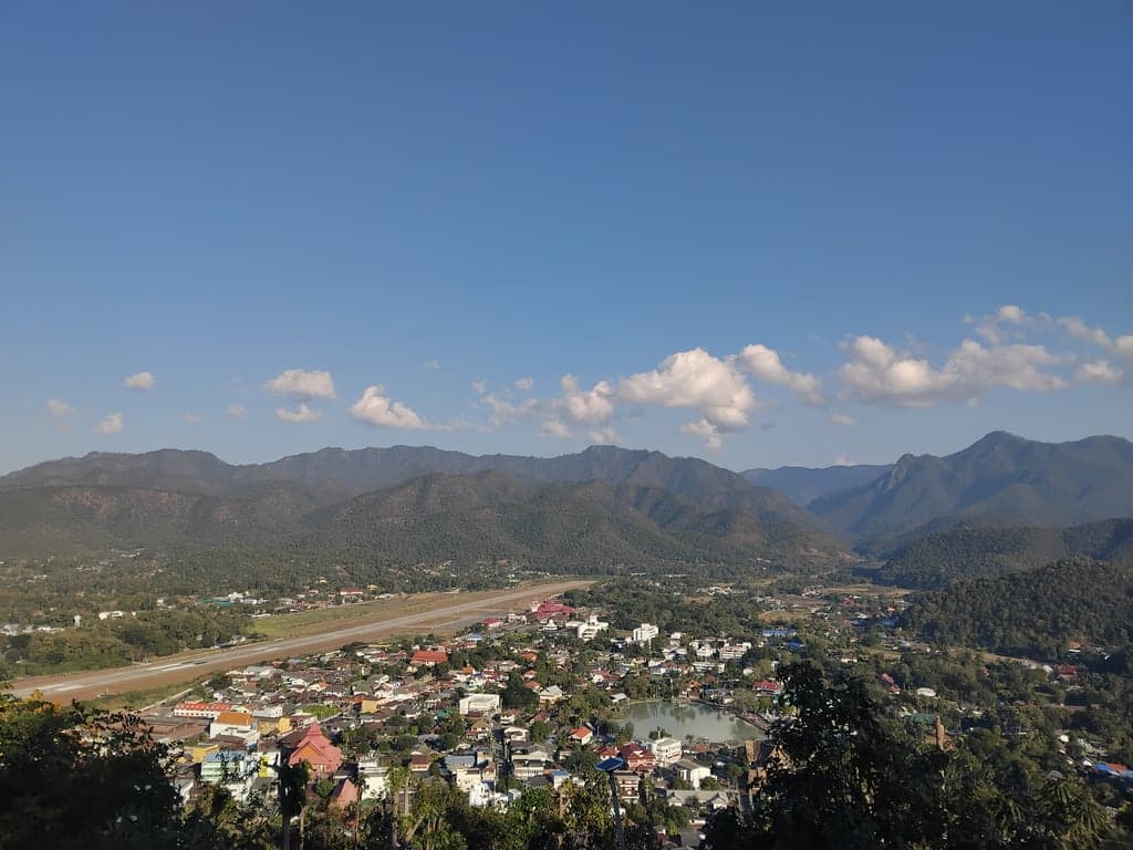 The panoramic view of Mae Hong Son town from a high mountain viewpoint.